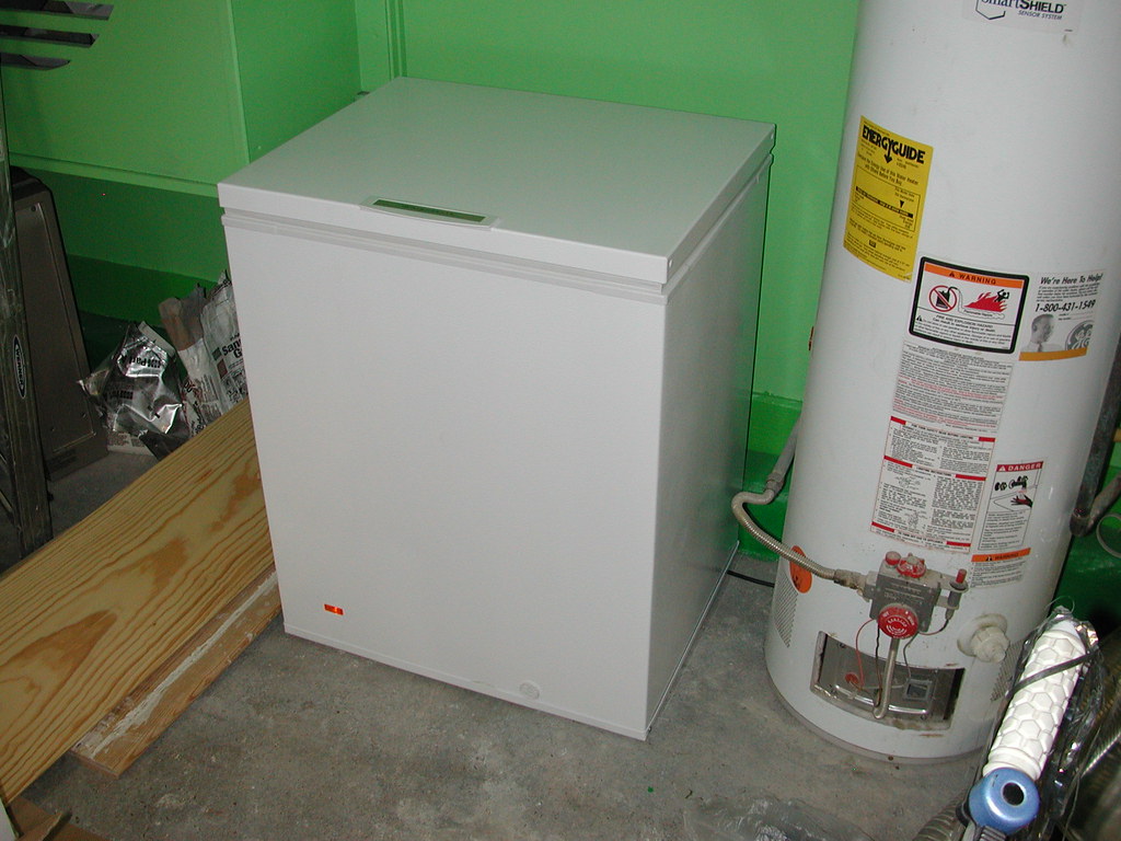 Freezer appliance in a home kitchen
